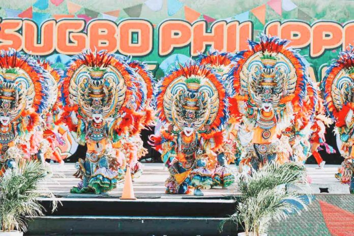 MassKara_resized Performers from Barangay Granada, Bacolod City, champions of the 2023 MassKara Festival, captivate Cebu City in a performance during the Sinulog Festival in January this year. BACOLOD CITY PUBLIC INFORMATION OFFICE PHOTO