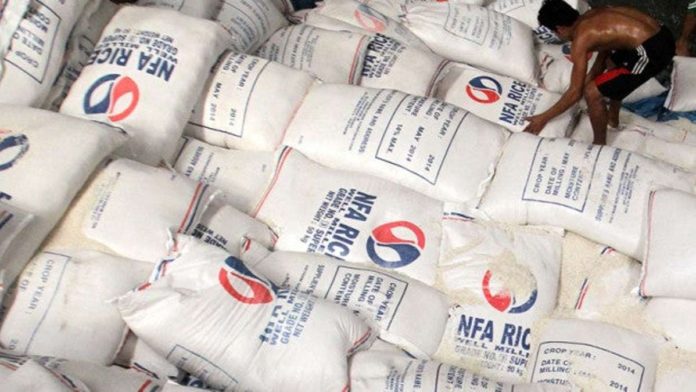 NFA_resized There is an ongoing investigation into the alleged disadvantageous sale of National Food Authority’s rice buffer stocks. Photo shows sacks of rice at an NFA warehouse. INQUIRER FILE / RAFFY LERMA