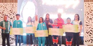 (From left) Athletes John Mark Pagdato and Ma. Jerlyn Ariego from Lemery, Iloilo; Marelyn Libuna from Calinog; and Precious Kylah Abreu and Sean Leumer Hitalia from Cabatuan receive their cash incentives from the Iloilo provincial government. Also in photo are Schools Division of Iloilo Superintendent Dr. Ernesto Servillon Jr., 2nd District Board member June Mondejar; Vice Gov. Christine Garin; Provincial Administrator Raul Banias; and Iloilo Sports Management and Development Office head Ma. Janelyn Fundal. IME SORNITO/PN