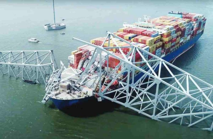 baltimore This handout screengrab courtesy of the National Transportation Safety Board taken on March 26, 2024, shows part of the steel frame of the Francis Scott Key Bridge sitting on top of the container ship Dali after the bridge collapsed in Baltimore, Maryland, on March 26, 2024. AFP, NATIONAL TRANSPORTATION SAFETY BOARD / YOUTUBE