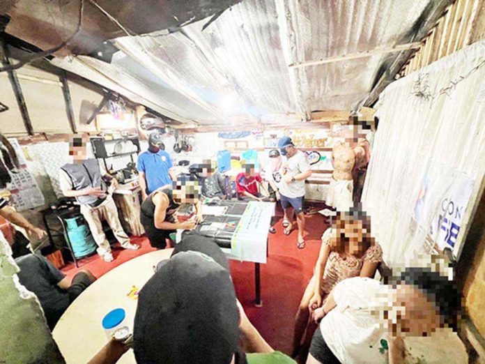 drug_den_resized Eight drug suspects, including the alleged drug den maintainer and his seven patrons, were cornered following a buy-bust operation in Barangay 3, Bacolod City on Thrusday afternoon, February 29. PDEA-RSET BRAVO PHOTO