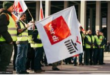 Millions of travellers affected by German air and rail strikes Workers demonstrate during a strike organized by the Ver.di union, at Berlin Brandenburg Airport, in Berlin, Germany. GETTY IMAGES
