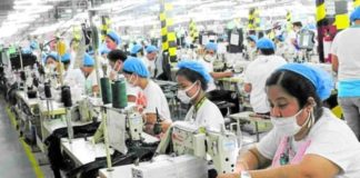 According to employers, if a one-time big-time pay hike were to happen, businesses may either push up the cost of goods to make up for losses due to the wage increase, lay off their workers, or firms still recovering from the impact of COVID-19 may be forced to close. Photo shows laborers at work in a factory at the Mactan Export Processing Zone in Lapu-Lapu City. Photo from the Facebook account of the MEPZ Workers Alliance