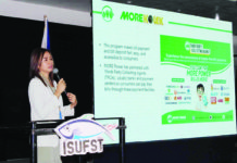 Atty. Allana Mae A. Babayen-on, AVP, Legal Officer of MORE Electric and Power Corporation, discusses the pivotal role of MORE Power in fostering progress and growth within the city and province of Iloilo during the Business and Investment Symposium at the Iloilo State University of Fisheries Science and Technology - Barotac Nuevo campus. AJ PALCULLO/PN