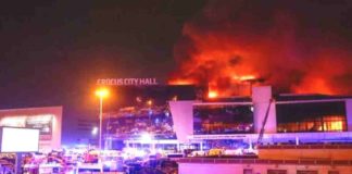 Smoke from fire rises above the burning Crocus City Hall concert venue where gunmen opened fire, killing 115 people. REUTERS