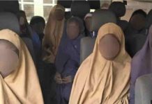 Nigerian pupils taken in mass abduction freed Some of the girls freed by kidnappers are pictured in a bus in Nigeria. The pupils were in a school compound assembly ground when the gunmen rode in earlier this month.