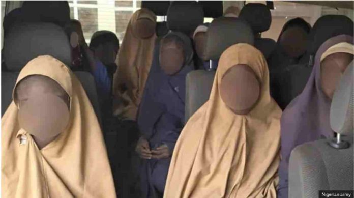 nigeria.JPG_resized Some of the girls freed by kidnappers are pictured in a bus in Nigeria. The pupils were in a school compound assembly ground when the gunmen rode in earlier this month.