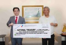 PAGCOR remits P4.59B to Treasury Philippine Amusement and Gaming Corporation (PAGCOR) chairman and CEO Alejandro Tengco (right) hands over a facsimile check to Deputy National Treasurer Eduardo Anthony Mariño III during a recent simple dividend turnover ceremony at the new PAGCOR Corporate Office in Pasay City. PAGCOR PHOTO