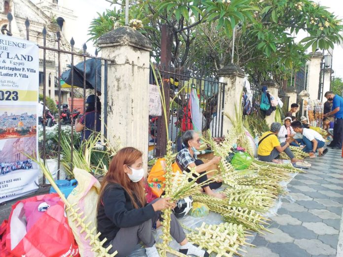 palm_sunday_pic_resized PALM SUNDAY marks the beginning of Holy Week. It commemorates Jesus Christ’s triumphant entry into Jerusalem where crowds greeted him by waving palm branches and covering his path with palm leaves. This Saturday, palm frond vendors are expected to start showing up in front churches such as the Jaro Metropolitan Cathedral in Jaro, Iloilo City in time for Sunday’s church activity. PN FILE PHOTO