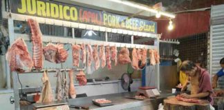 Samuel Juridico, with a stall at the Pavia Public Market, sells pork at P400 per kilo. AJ PALCULLO/PN