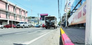 The red and yellow road traffic markings in Bacolod City signify absolute and regulated tow-away zones, respectively, under City Ordinance No. 818. JOSE ANTONIO ROBELLO PHOTO