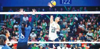 Negrense Angel Canino of De La Salle University Lady Spikers goes for an attack against Ateneo de Manila University Blue Eagles. UAAP PHOTO