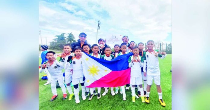 sports Filipinas_superimposed Filipinas San Carlos U-12 football team topped the U-12 category (silver group) of the 2024 Real Madrid Foundation Clinics World Challenge in Spain. The Filipinas San Carlos U-12 football team is based in San Carlos City, Negros Occidental. PHOTO COURTESY OF RENE GUSTILLO