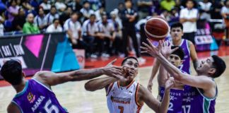 NorthPort Batang Pier’s Zavier Lucero and Converge FiberXers’ Mike Nieto battle for the rebound. PBA PHOTO