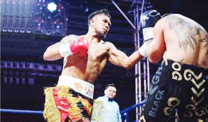sports_Eumir_resized Eumir Marcial unloads a left uppercut to the face of Thai fighter Thoedsak Sinam. PHOTO COURTESY OF CHOOKS-TO-GO PILIPINAS