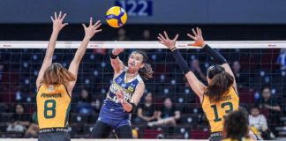 National University Lady Bulldogs’ Mhicaela Belen scores against the defense of Far Eastern University Lady Tamaraws. UAAP PHOTO