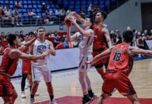 NLEX Road Warriors’ Robert Bolick Jr. had his shot blocked by the defense of Blackwater Bossing’s Rey Suerte. PBA PHOTO