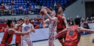 NLEX Road Warriors’ Robert Bolick Jr. had his shot blocked by the defense of Blackwater Bossing’s Rey Suerte. PBA PHOTO