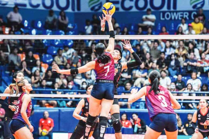 Aklanon Dell Palomata of PLDT High Speed Hitters goes for a shot against the defense of Choco Mucho Flying Titans’ Madeleine Madayag. PVL PHOTO