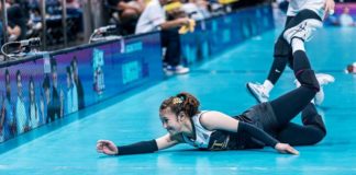 University of Santo Tomas Golden Tigresses’ Bernadeth Pepito dives on the ground in an attempt to save the ball. UAAP PHOTO
