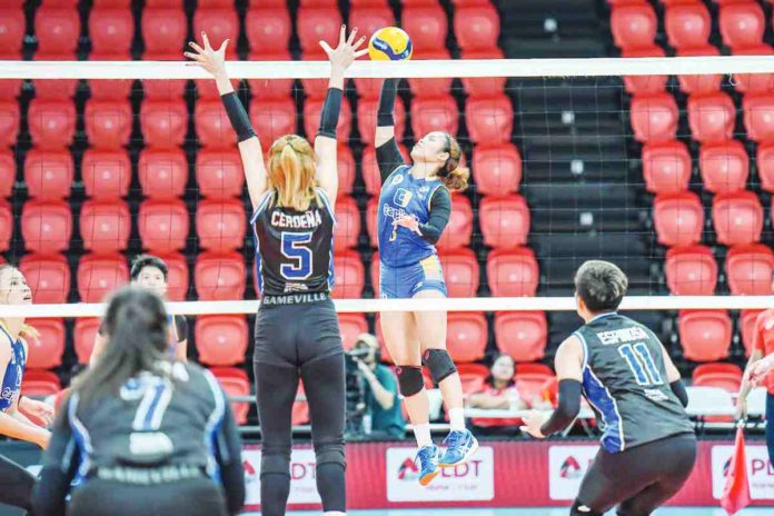 sports_capital1_resized Capital1 Solar Spikers’ Ja Lana attempts to score against the defense of Strong Group Athletics’ Noheli Cerdena. PVL PHOTO