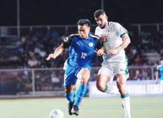 Philippine Azkals’ Armani Aguinaldo kicks the ball away from an Iraqi defender. PNMFT PHOTO