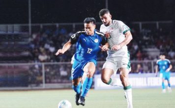 Philippine Azkals’ Armani Aguinaldo kicks the ball away from an Iraqi defender. PNMFT PHOTO