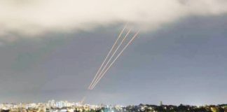 An Israeli anti-missile system operates after Iran launched drones and missiles towards Israel, as seen from Ashkelon on April 13. REUTERS
