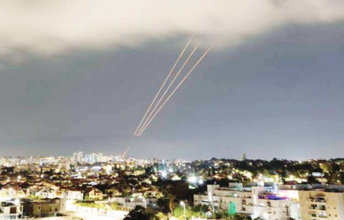 PH_copy_resized An Israeli anti-missile system operates after Iran launched drones and missiles towards Israel, as seen from Ashkelon on April 13. REUTERS
