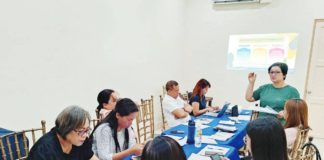 Leni Causing, Iloilo Provincial Health Office Nutrition Program coordinator, discusses with the members of the Provincial Nutrition Committee and Provincial Nutrition Technical Working Group the conduct of the 1st Punong Barangay Nutrition Congress from April 10 to 11, 2024. PHOTO COURTESY OF PHILIPPINE INFORMATION AGENCY