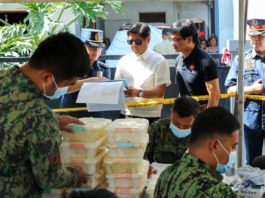 President Ferdinand Marcos Jr. along with Interior Secretary Benjamin Abalos Jr. and Philippine National Police chief General Rommel Francisco Marbil check on the inspection of crystal meth seized in a Batangas town. The operation which led to the seizure of shabu weighing around two tons and amounting to P13.2 billion, is the biggest-ever drug bust in the country. PCO