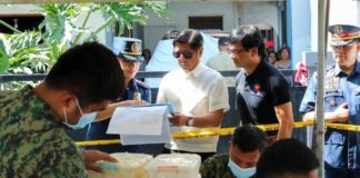 President Ferdinand Marcos Jr. along with Interior Secretary Benjamin Abalos Jr. and Philippine National Police chief General Rommel Francisco Marbil check on the inspection of crystal meth seized in a Batangas town. The operation which led to the seizure of shabu weighing around two tons and amounting to P13.2 billion, is the biggest-ever drug bust in the country. PCO