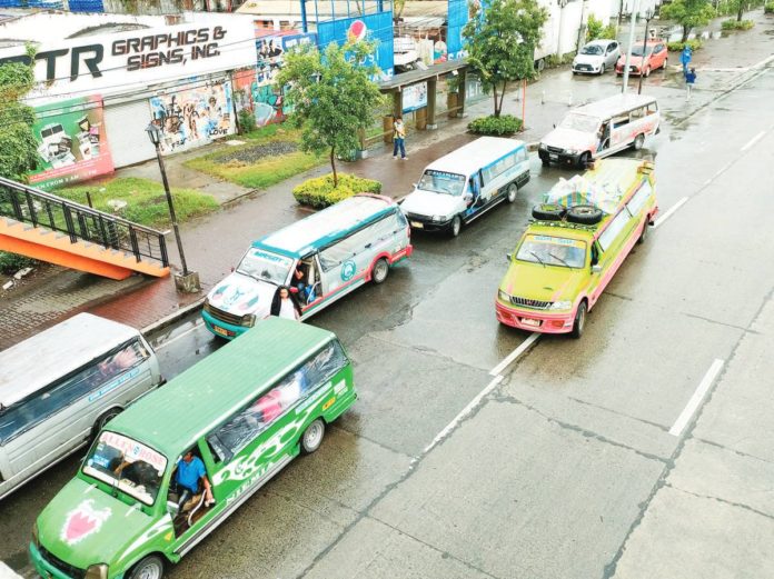 Photo shows traditional jeepneys in Iloilo City
