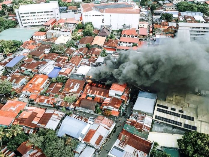 mai_fire_investigation_result_resized This drone shot captures the scale of the fire that hit a thickly-populated neighborhood in Barangay San Nicolas, La Paz, Iloilo City on Feb. 18, 2024. MORE POWER PHOTO