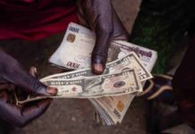 Throwing money a crime in Nigeria Photo courtesy of Bloomberg