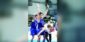 Bacolod City of Smiles’ MacLean Sabellina tries to control his balance after bumping into Sarangani Marlins’ Coy Alves. MPBL PHOTO