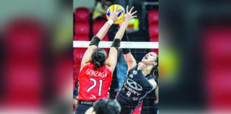 Chery Tiggo Crossovers’ Ejiya Laure attempts to score against the defense of Cignal HD Spikers’ Roselyn Doria. PVL PHOTO