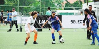 Makati FC’s Andie Bautista tries to break through the Valencia CF defense during their JSSL Singapore Academy 7’s Girls 16 pro category match. MAKATI FC PHOTO