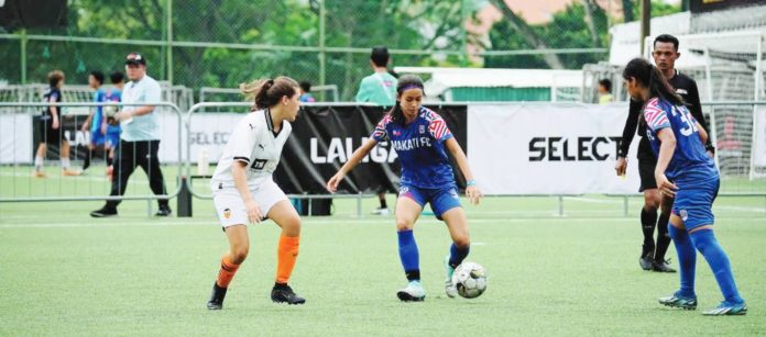sports makati Makati FC’s Andie Bautista tries to break through the Valencia CF defense during their JSSL Singapore Academy 7’s Girls 16 pro category match. MAKATI FC PHOTO