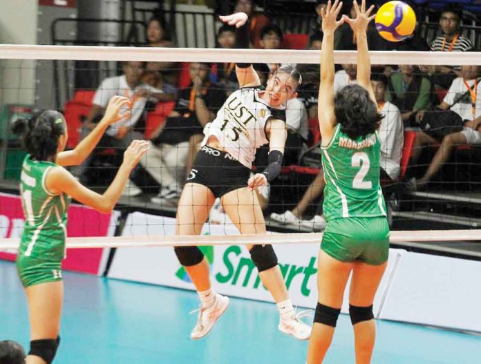 Negrense Kimberly Chelmei Rubin leads University of Santo Tomas Junior Golden Tigresses to the PNVF U-18 Girls championship. PNVF PHOTO