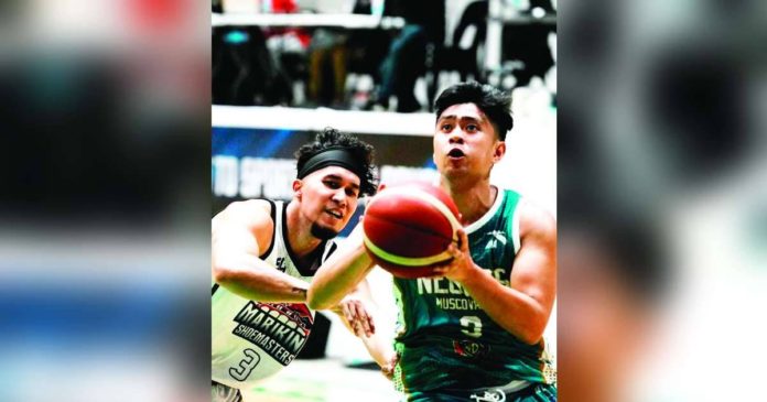 sports negros_superimposed Negros Muscovados’ Hubert Cani attempts for a basket after evading the defense of Marikina Shoemasters’ Joe Gomez de Liano. PHOTO COURTESY OF ARMANDO ANTONIO PAOLO A GONZALES III