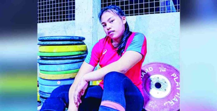 sports weightlifter_superimposed Vanessa Sarno is a two-time Southeast Asian Games gold medalist in weightlifting.