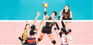 Far Eastern University Lady Tamaraws’ Chenie Tagaod drops the ball to the defense of University of the East Lady Warriors. UAAP PHOTO