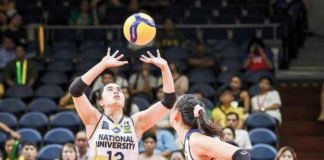 Guimarasnon Camille Lamina tosses the ball to a National University Lady Bulldogs teammate. UAAP PHOTO