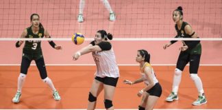 University of Santo Tomas Golden Tigresses’ Bianca Plaza saves the ball from an attack by De La Salle University Lady Spikers. UAAP PHOTO