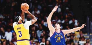 Denver Nuggets’ Nikola Jokić attempts to block the shot of Los Angeles Lakers’ Anthony Davis. AP PHOTO