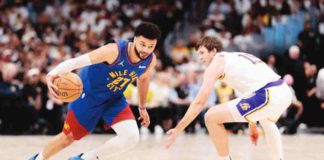 Denver Nuggets’ Jamal Murray (27) drives to the basket against Los Angeles Lakers’ Austin Reaves (15). PHOTO BY ANDREW WEVERS-USA TODAY SPORTS