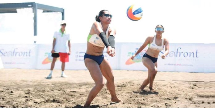 sports_negrense_resized Negrense Melody Pons of Far Eastern University Lady Tamaraws digs the ball as her teammate Sheena Cafe looks on. PHOTO COURTESY OF BVR