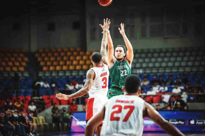 Terrafirma Dyip’s Javi Gomez de Liano pulls up for a shot against the defense of Barangay Ginebra San Miguel Kings’ Jamie Malonzo. PBA PHOTO