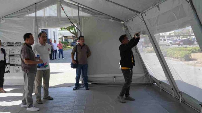 tent_1_resized Gov. Arthur Defensor Jr. inspects a modular tent from the Philippine Red Cross in connection with his plan to acquire more of the said facility to be used as temporary classrooms in schools. BALITA HALIN SA KAPITOLYO/FACEBOOK PHOTO